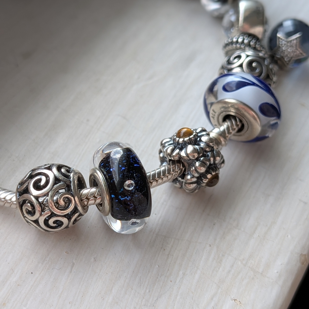 Pandora Bracelet with Charms: Blue Glass and Silver Floral Accents - Picture 5 of 7
